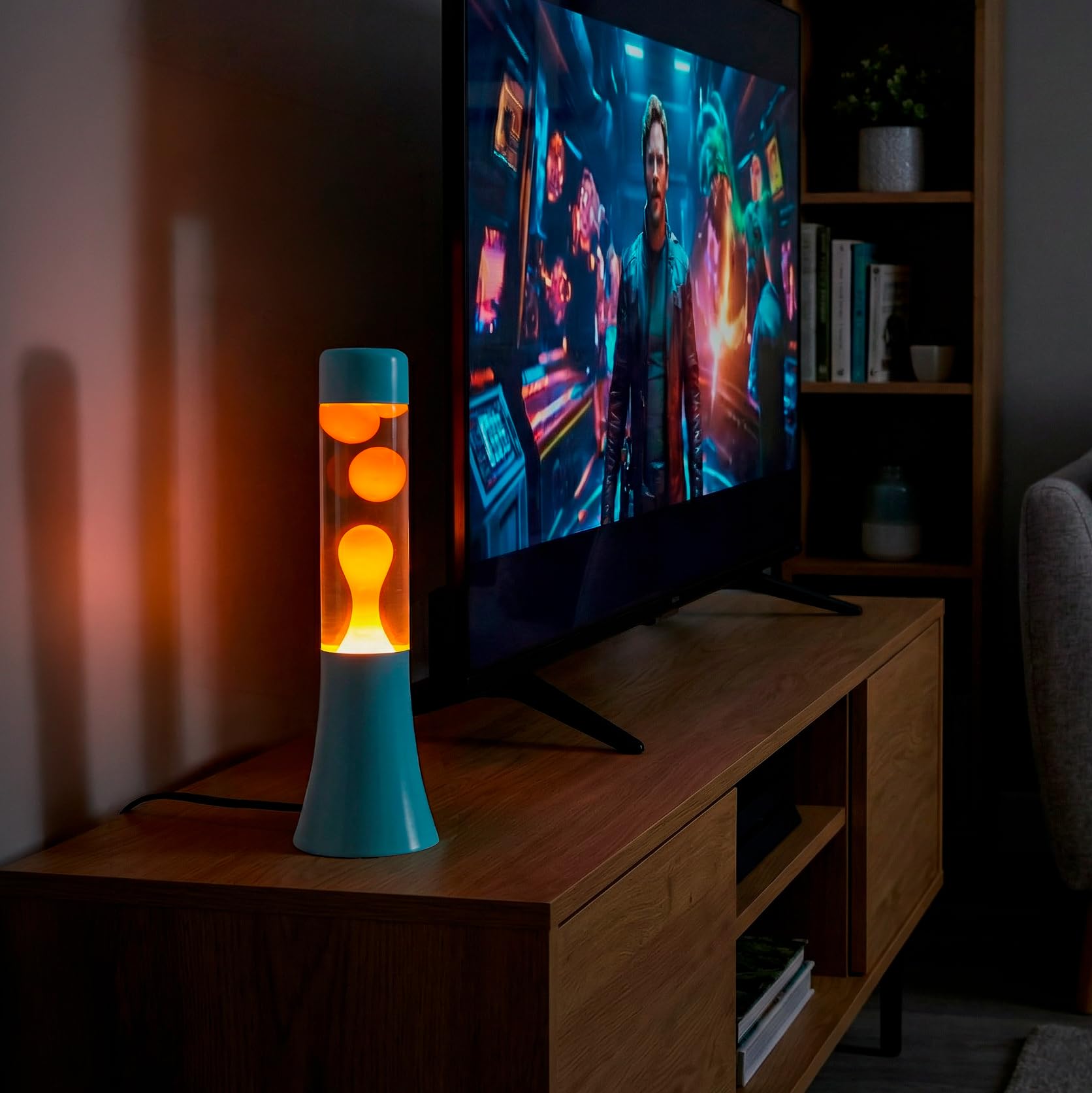 Fisura - Lámpara de lava azul y naranja de 30 cm. Lámpara decorativa relajante. Diseño original para hogar. Regalo original retro. Base azul y líquido naranja. 9x9x30 centímetros.