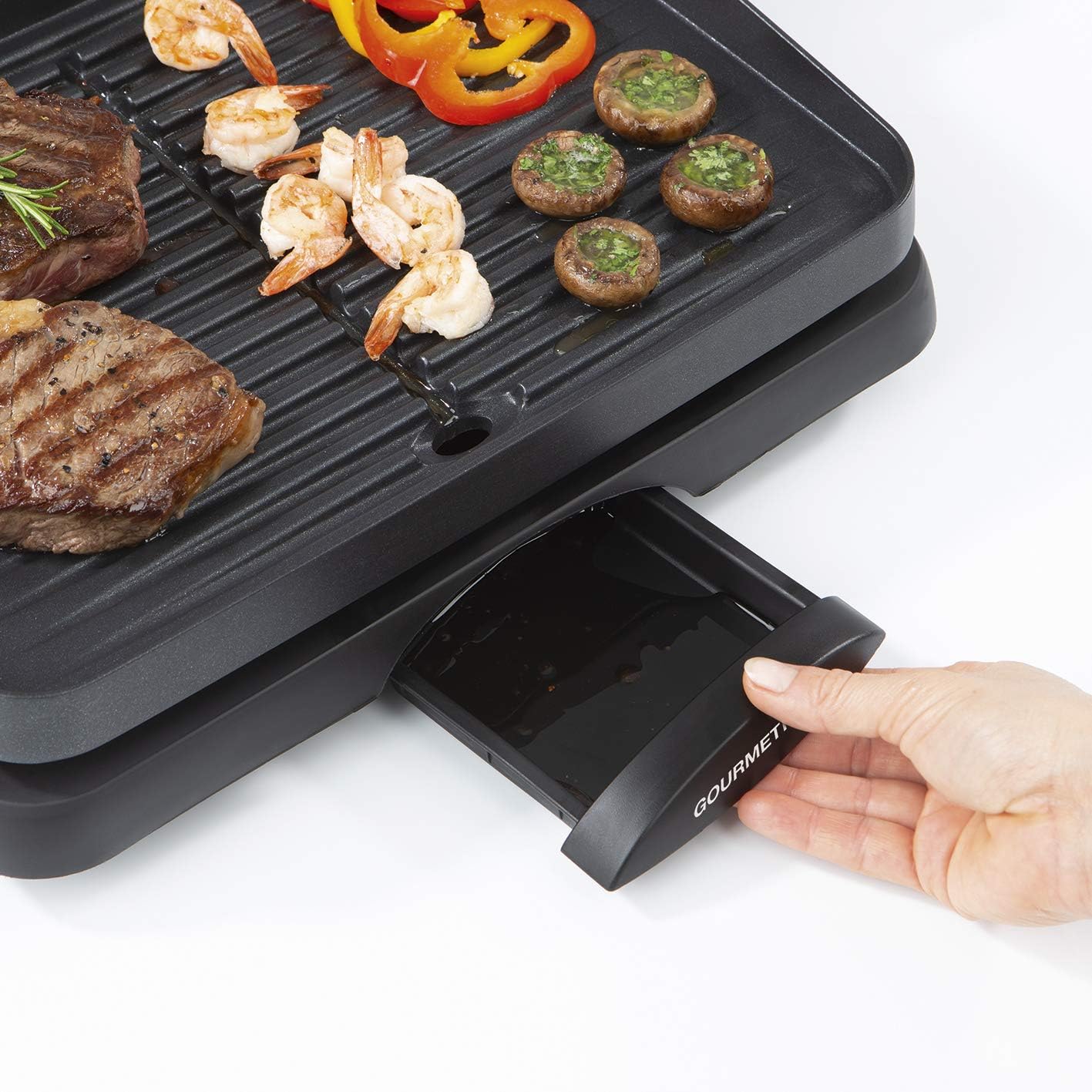 Gourmetmaxx Barbecue elettrico da tavolo con superficie in alluminio pressofuso, senza fumo, adatto per interni ed esterni, rivestimento antiaderente e con una vaschetta raccogli grasso, 1500 W, nero Gourmetmaxx Barbecue elettrico da tavolo con superficie in alluminio pressofuso, senza fumo, adatto per interni ed esterni, rivestimento antiaderente e con una vaschetta raccogli grasso, 1500 W, nero
