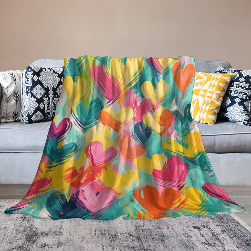 Couverture canapé et salon motif cœur pour soirée cocooning