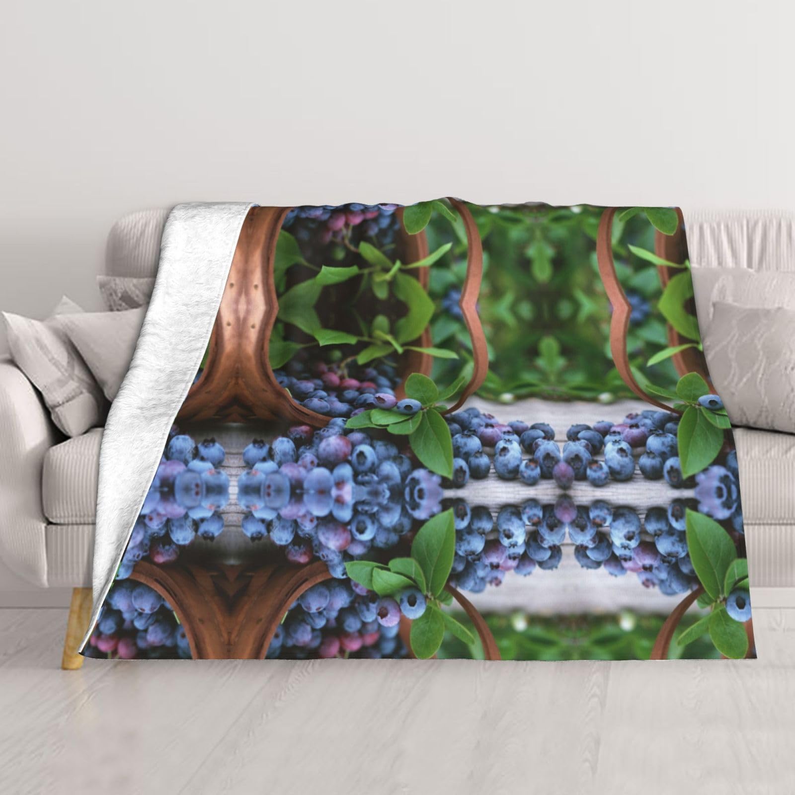 Couverture en peluche myrtilles pour vos soirées cocooning sur le canapé