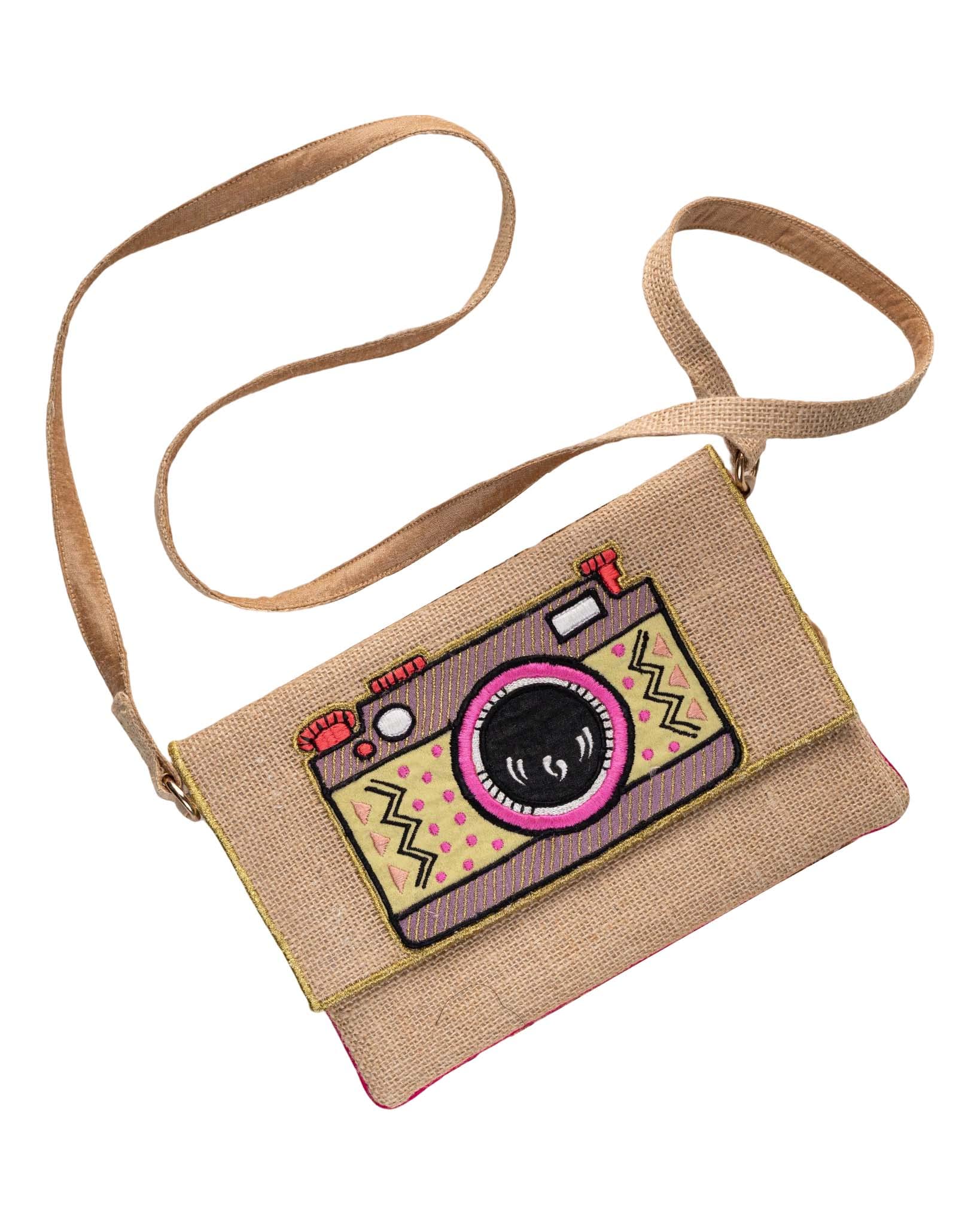 camera cross body bag baked beige color with green and purple camera
