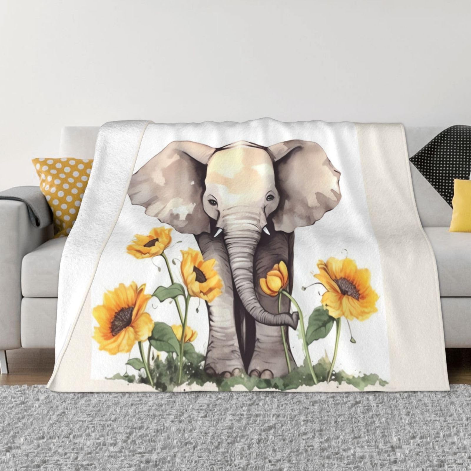 Couverture polaire imprimée pour cocooning sur le canapé du salon