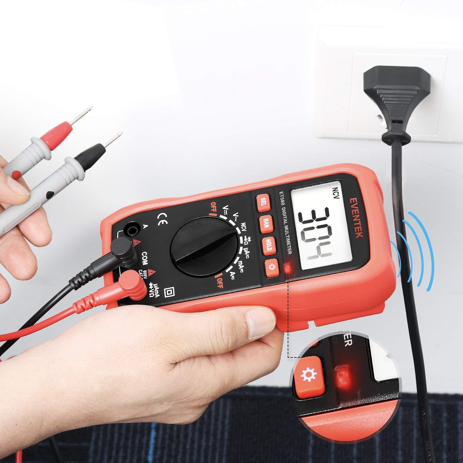 Eventek ET580 Digital Multimeter performing NCV detection near a power cord