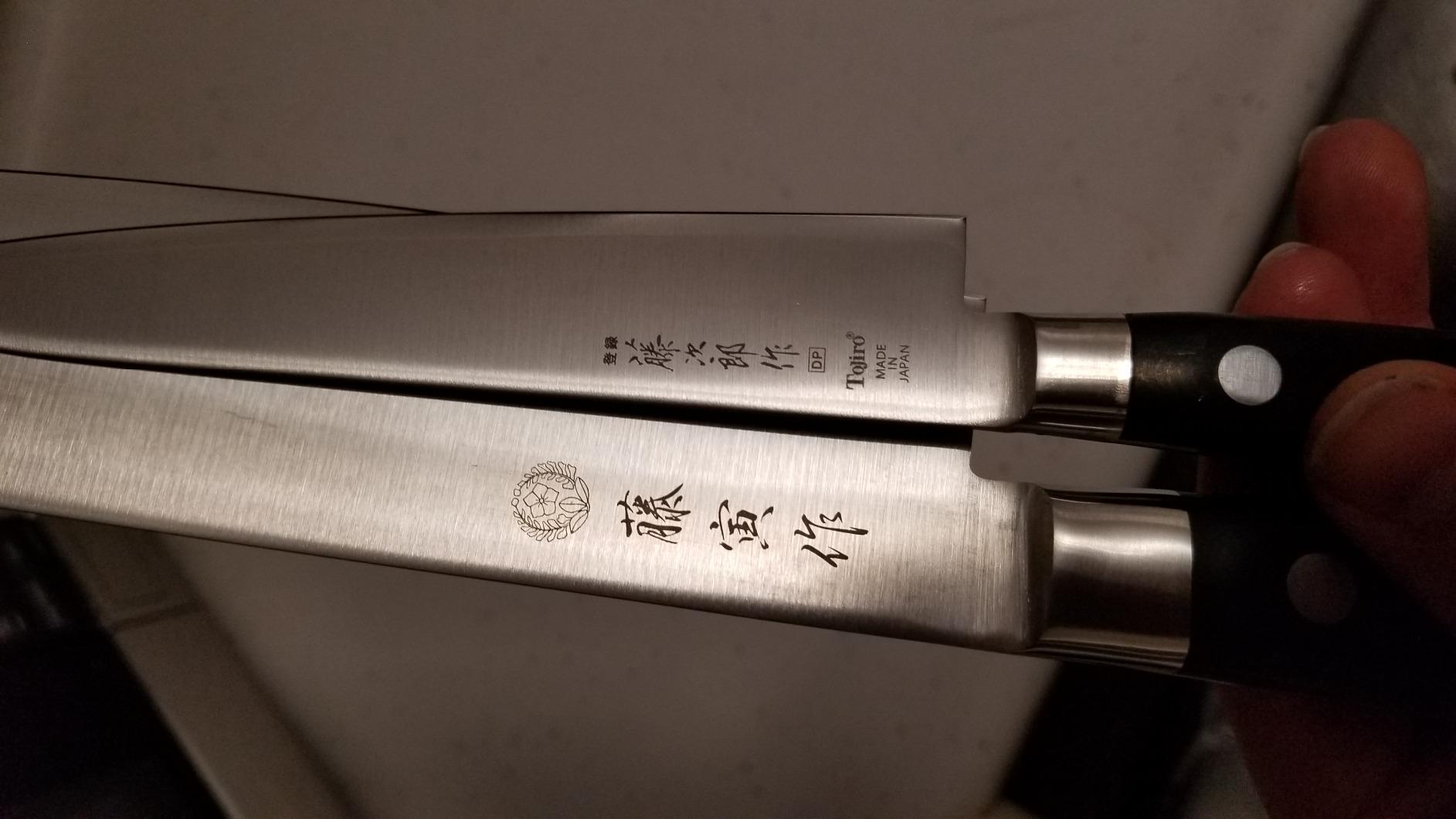Best nakiri knives lined up on a wooden cutting board with fresh vegetables