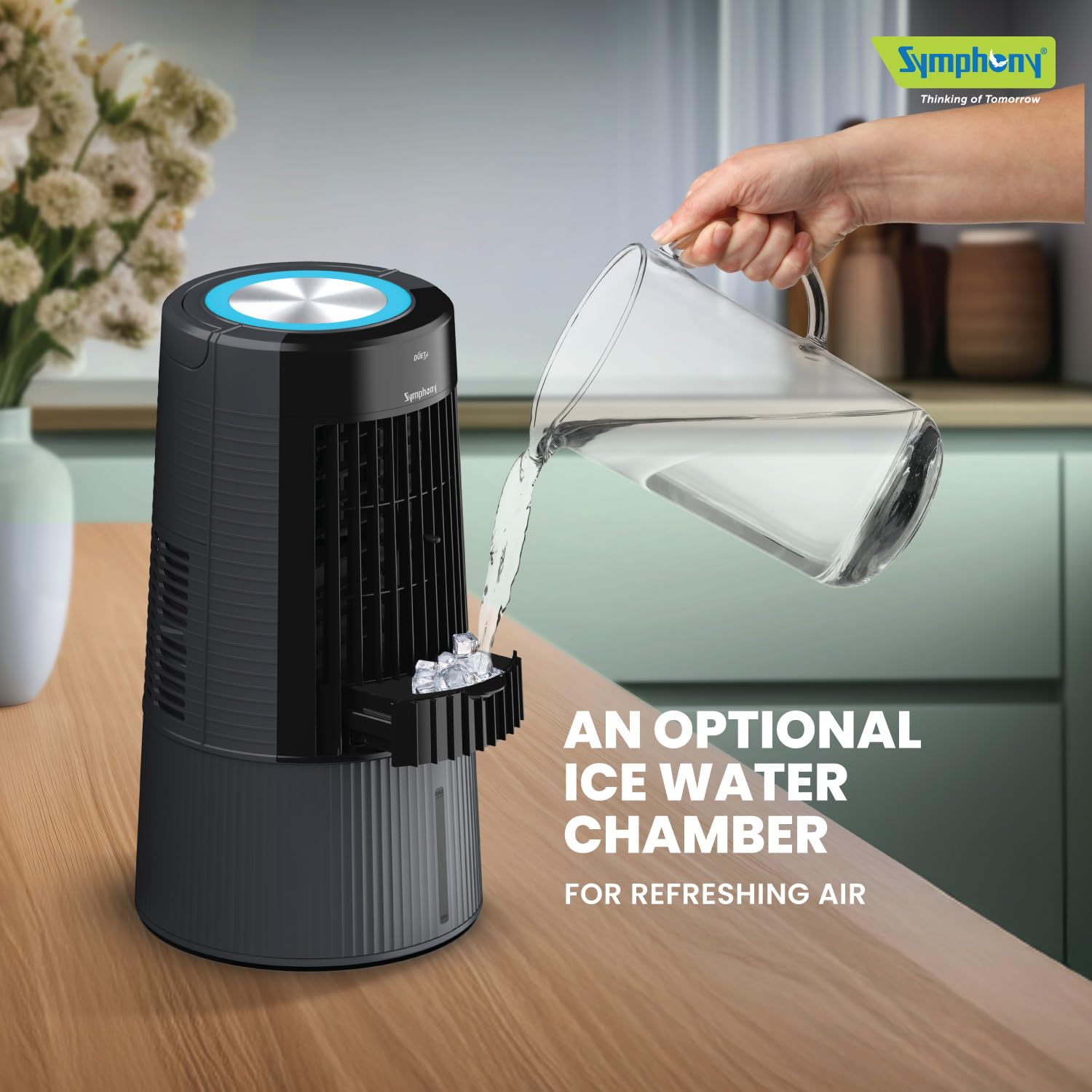 Hand pouring water and ice into the Symphony Duet-i's ice water chamber