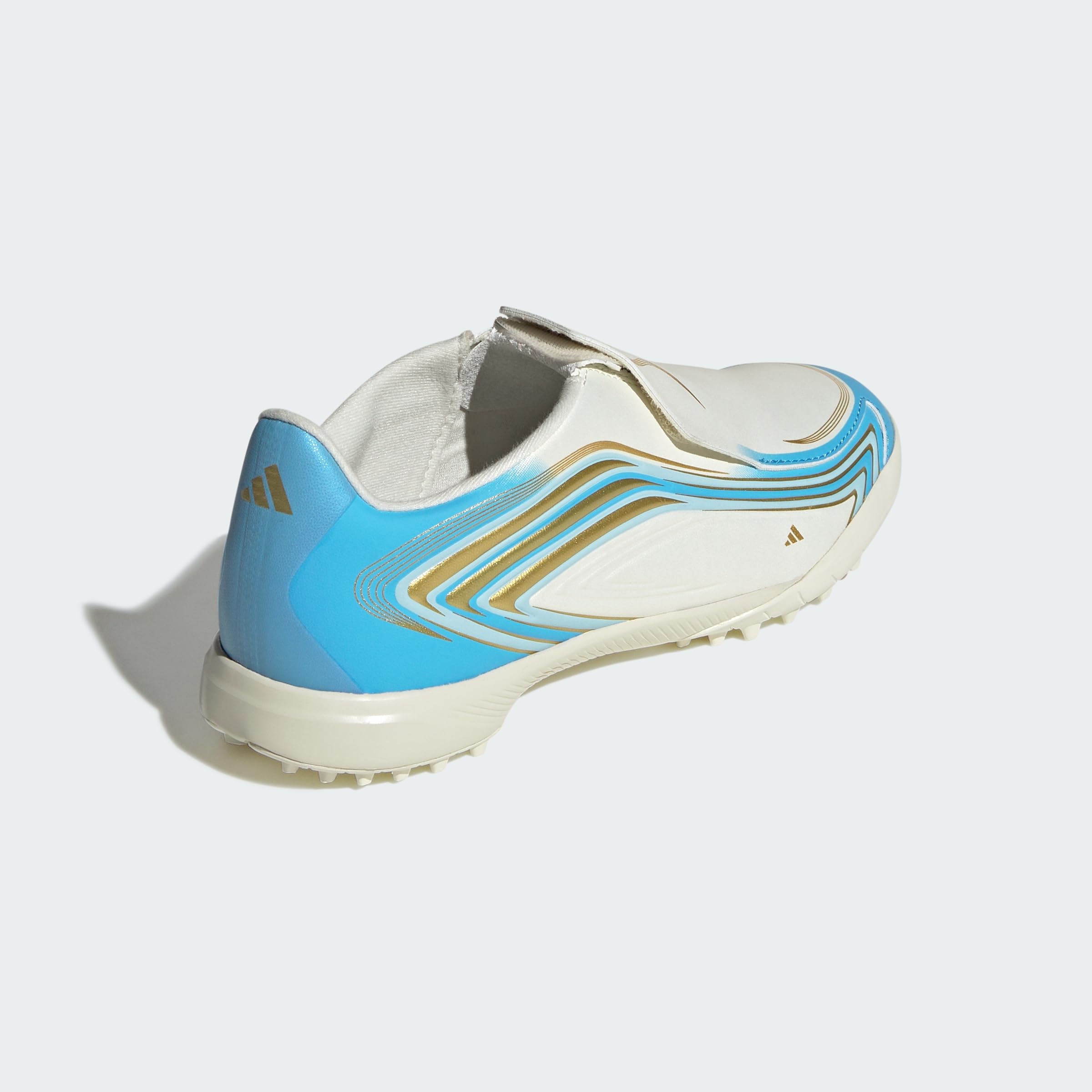 adidas Uniseks - dzieci F50 Messi League Laceless Turf Football Kids Shoes, ivory/semi blue burst/icey blue, 31 EU