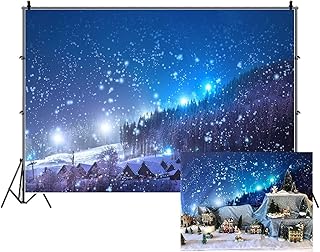 Leowefowa 7X5FT Christmas Backdrop Rustic Village Night View Forest Trees Snowing Shining Lights Blue Sky Winter Xmas Vinyl Photography Background Kids Children Adults Photo Studio Props