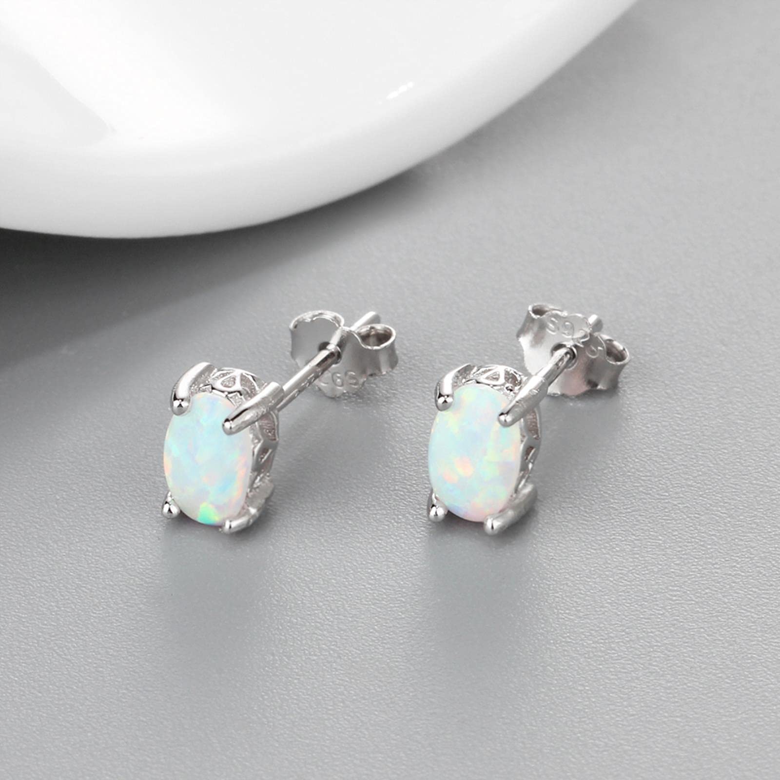 Orecchini a lobo in argento sterling con stella opale, gioielli