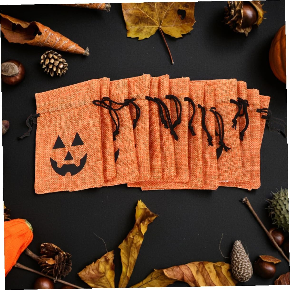 PERSELOSO 50pcs Halloween Small Burlap Treat Bags with Drawstring Pumpkin Design Orange Linen Candy Pouches for Party Favors Adults Wrapping Supplies