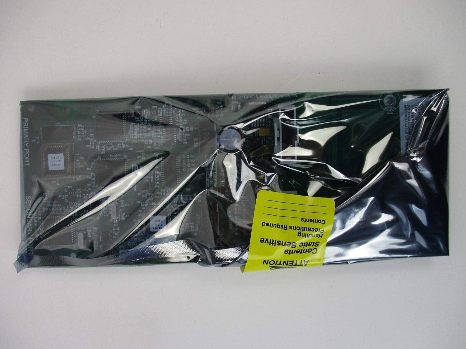 Simplex 4010ES Network Interface Card sealed in anti-static bag with 'ATTENTION Static Sensitive' label