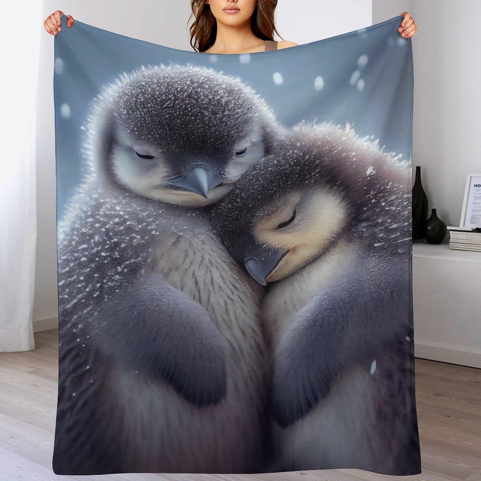 Couverture jeté flannel pingouin pour votre sieste sur canapé