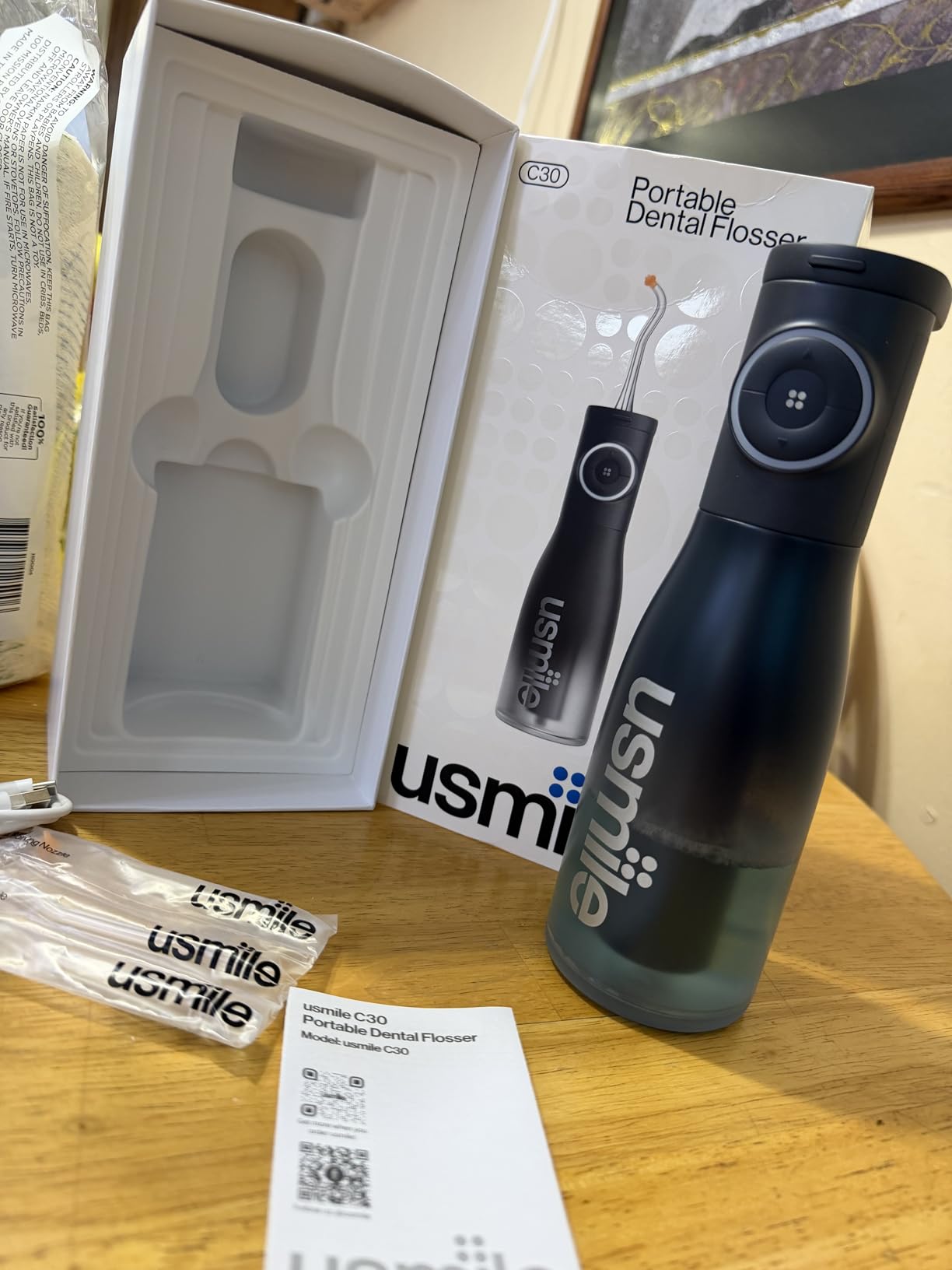 usmile C30 Cordless Water Flosser, 300ml Large Tank, 5 Pressure Levels Deep Clean, S-Shaped Nozzles for Braces & Sensitive Gums, USB-C Rechargeable, IPX7 Waterproof, Portable Travel & Home Use(Black)