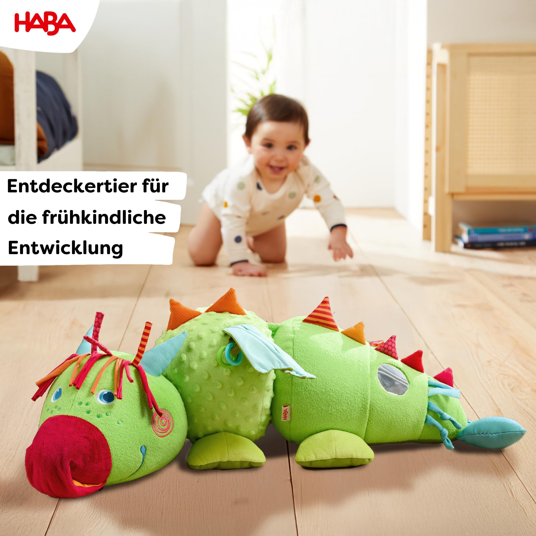 HABA Entdeckertier Drache Rudy – Plüschdrache mit akkustischen & haptischen Elementen, Rassel, Quietsche und Spiegel, Kuscheltier für Kinder ab 6 Monaten – 2012334001