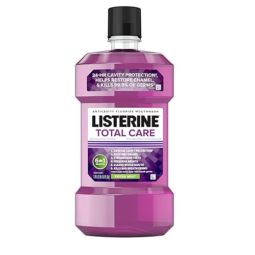 Listerine Total Care Anticavity Fluoride Mouthwash, 6 Benefits in 1 Oral Rinse Helps Kill 99% of Bad Breath Germs, Prevents Cavities, Strengthens Teeth, ADA-Accepted, Fresh Mint, 1 L - 33.8 Fl Oz (Pack of 1)
