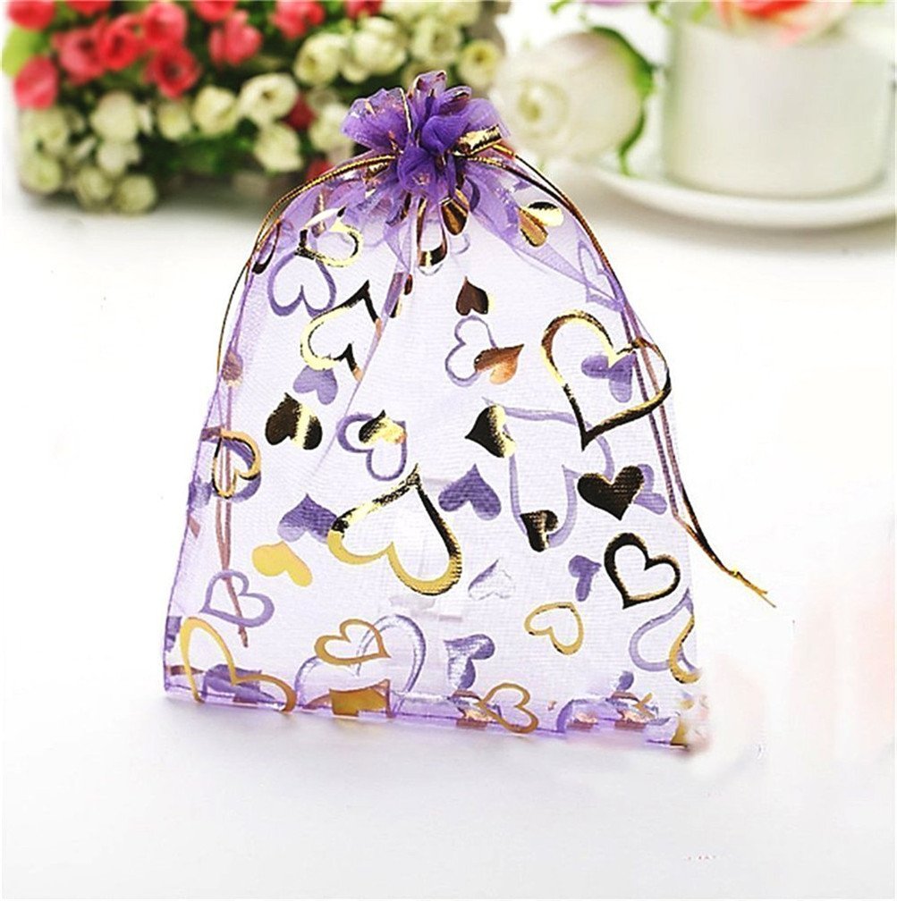 Cajas de regalo y fundas de plástico rosa para empaque decorativo de golosinas y detalles