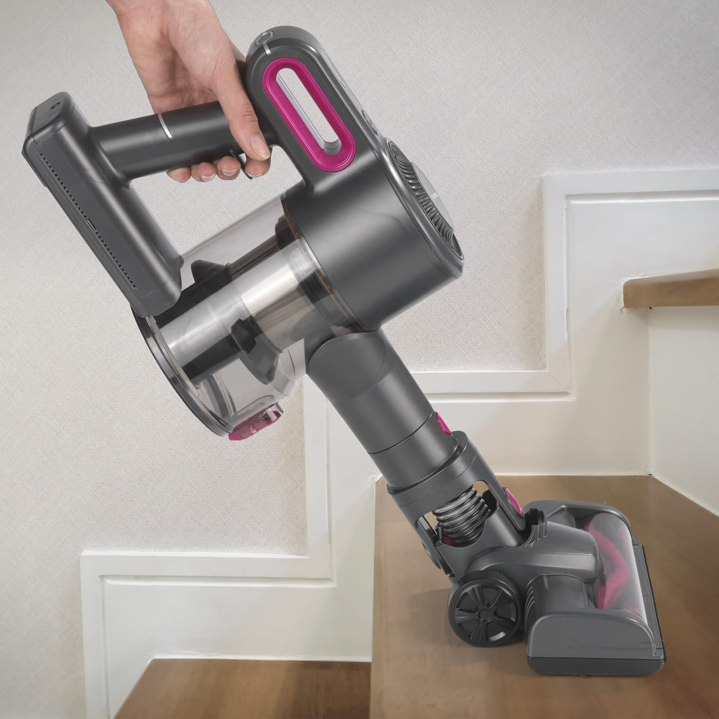 CLEANmaxx Cordless Cyclonic Vacuum Cleaner used in handheld mode on stairs