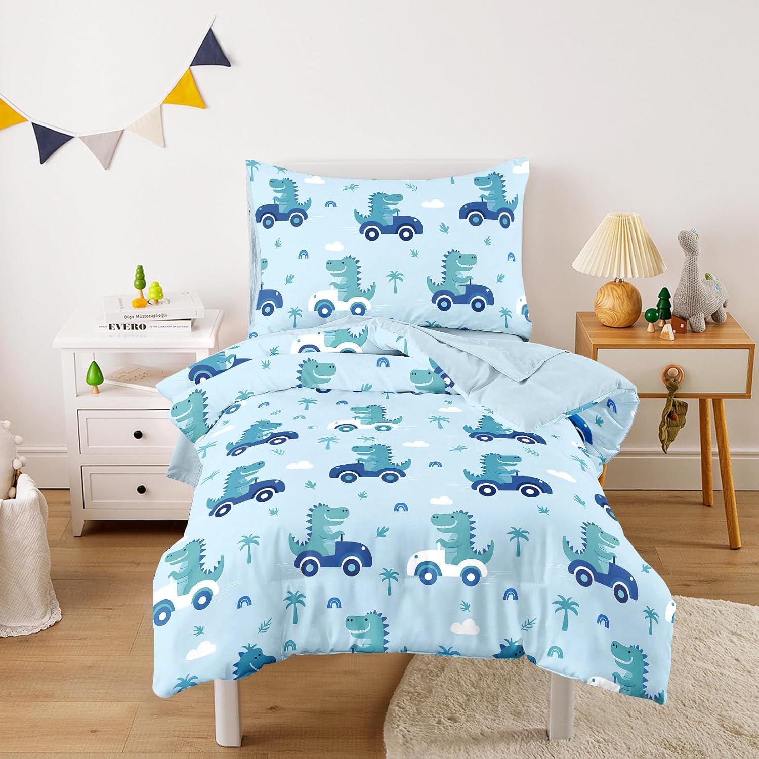 Wake In Cloud - Dinosaur Toddler Bedding Set for Boys, Cute Dino Driving Cars, 4 Pieces Soft Crib Bed Set Including Comforter, Sheets and Pillowcase, Light Blue