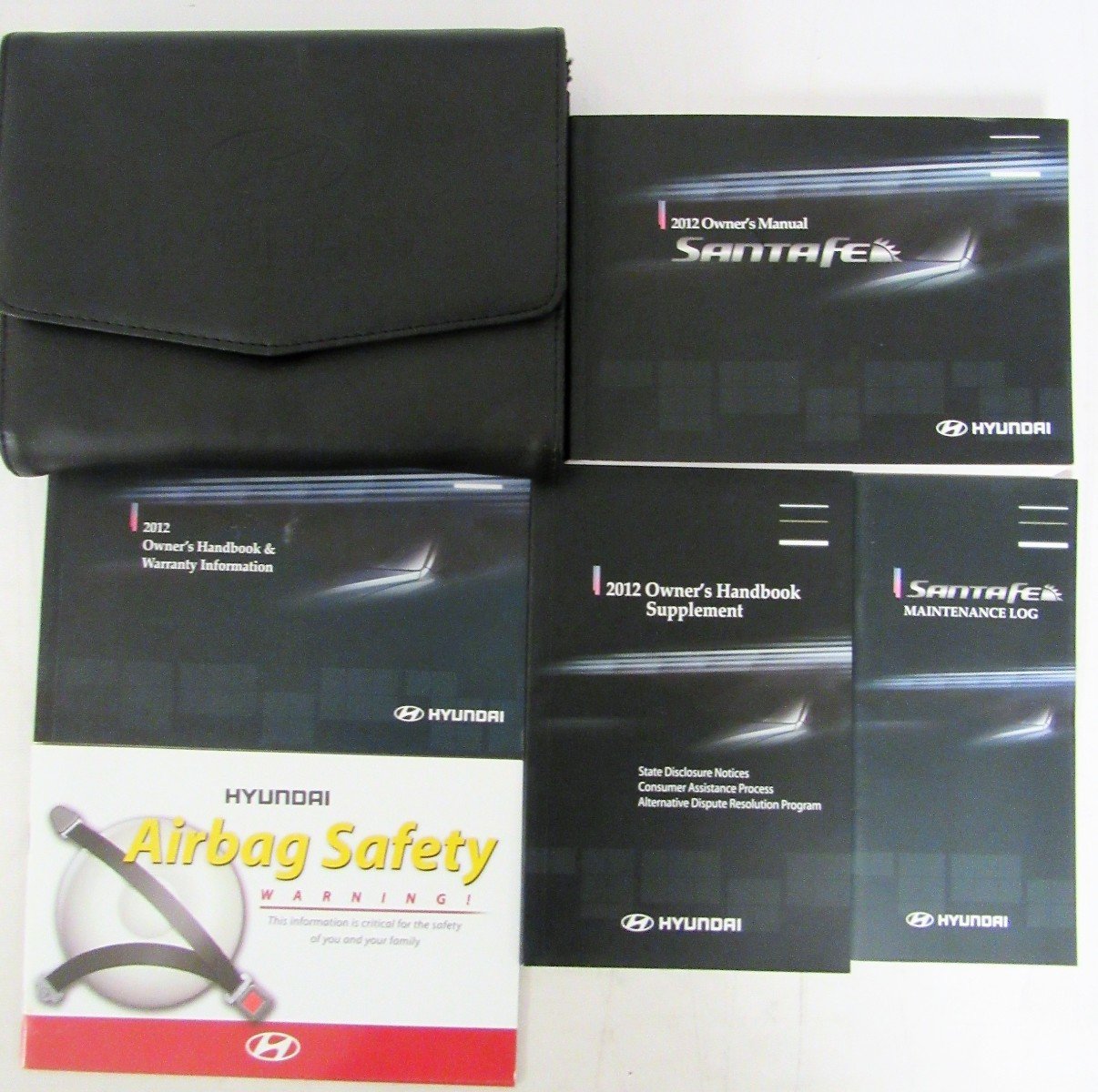Black Hyundai branded folder for manuals