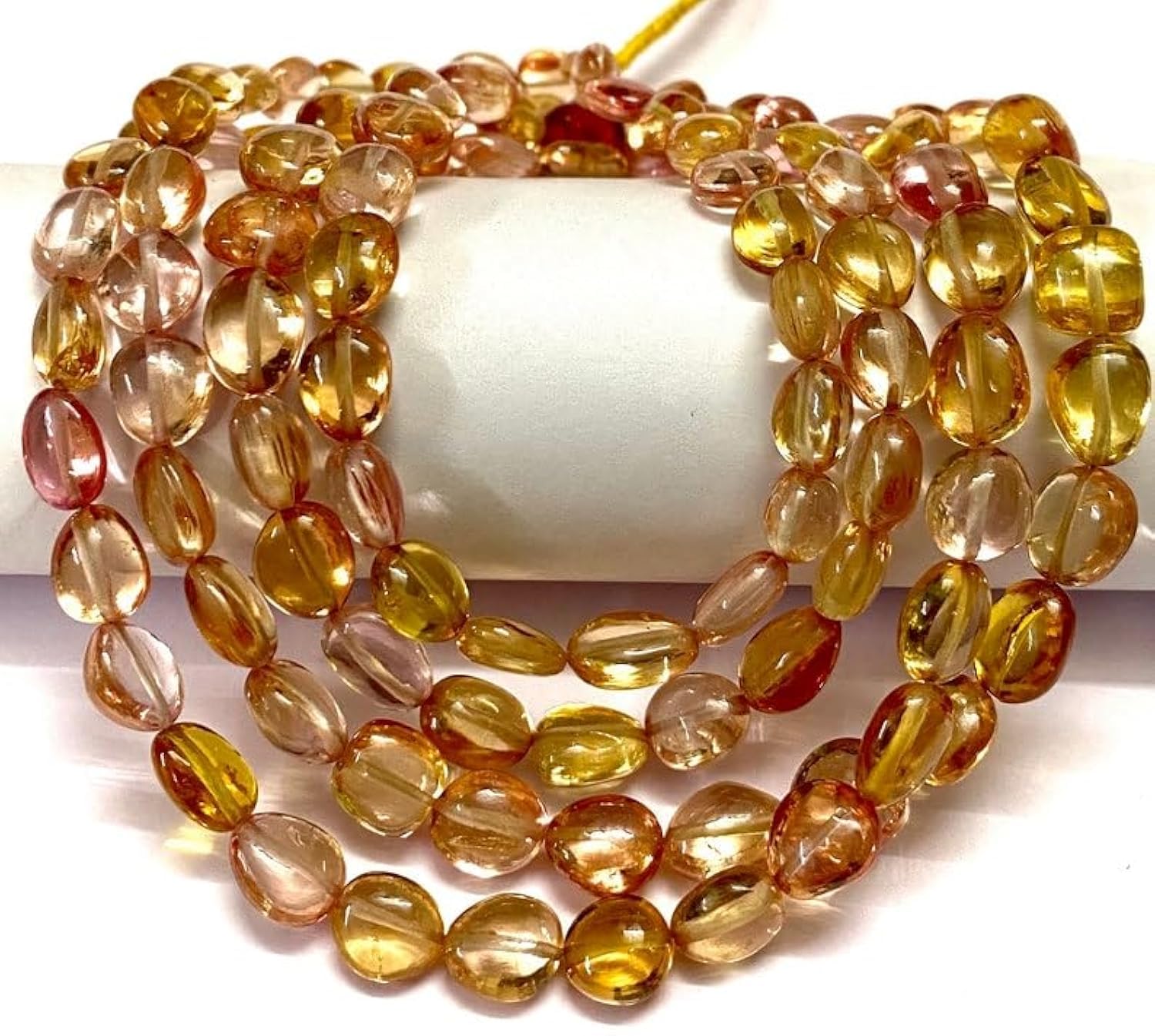 Perles ovales en saphir naturel de 6-8 mm pour créer vos colliers de mariage élégants