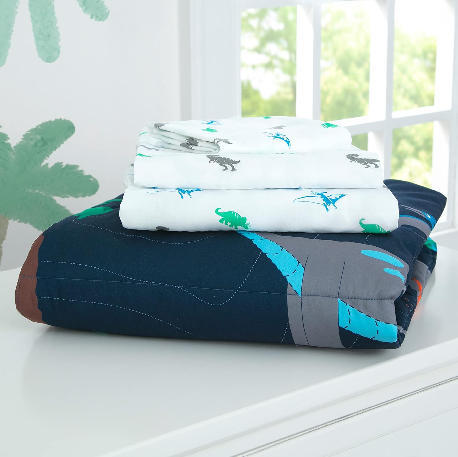 Delta Children 4 Piece Toddler Bedding Set for Boys - Reversible 2-in-1 Comforter - Includes Fitted Comforter to Keep Little Ones Snug, Bottom Sheet, Top Sheet, Pillow Case - Jurassic Dinosaur