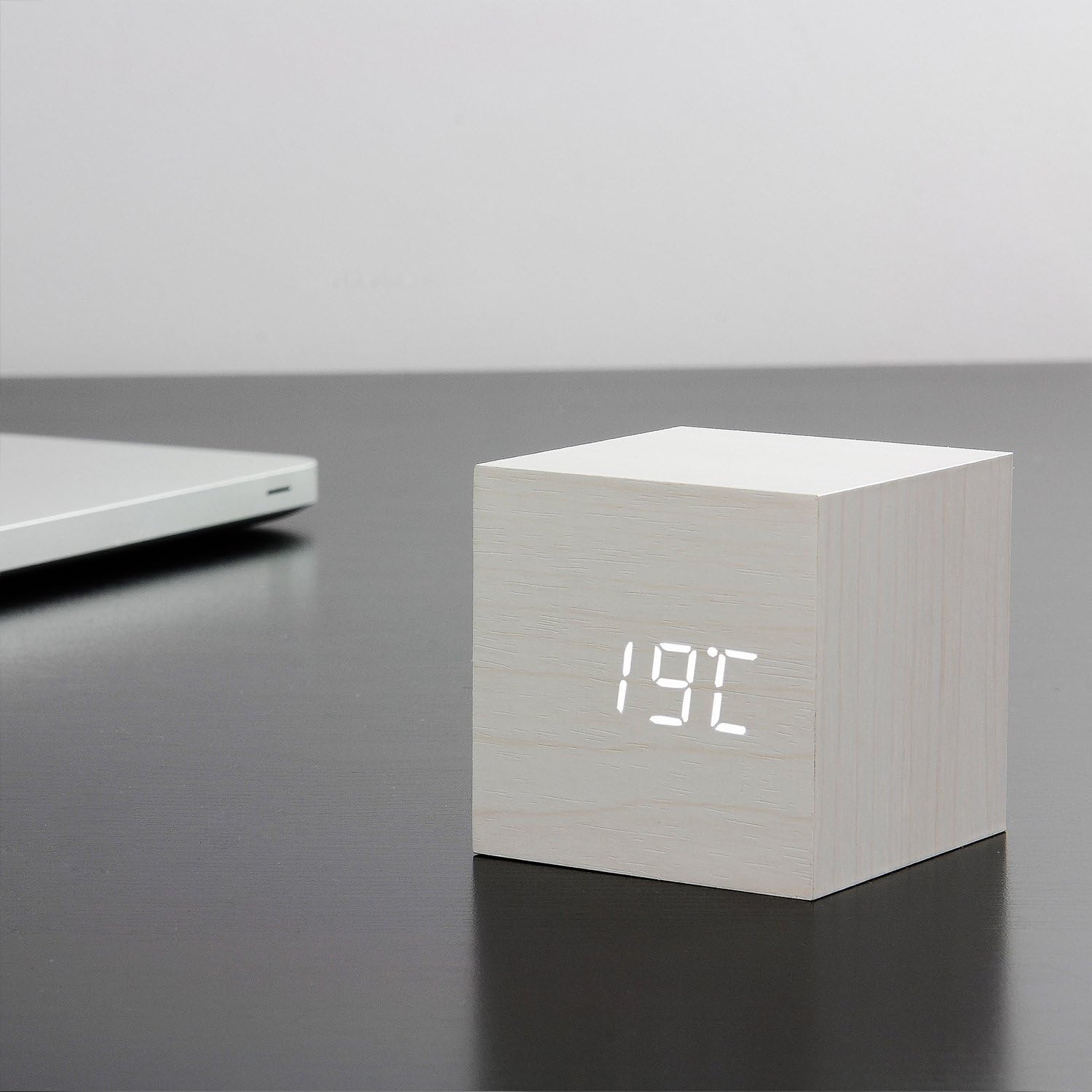 Gingko Cube LED Click Clock displaying 19 degrees Celsius on a desk