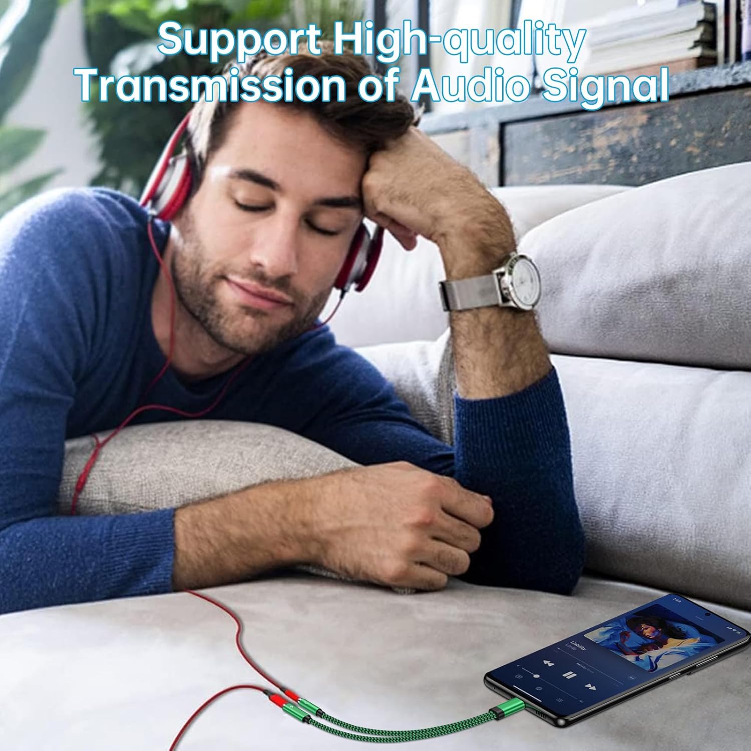 Person listening to music with adapter
