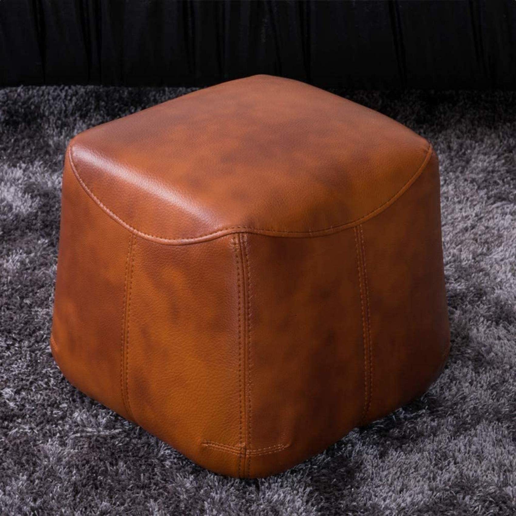 Repose-pieds rembourré en cuir : petit tabouret ottoman et pouf confort pour salon