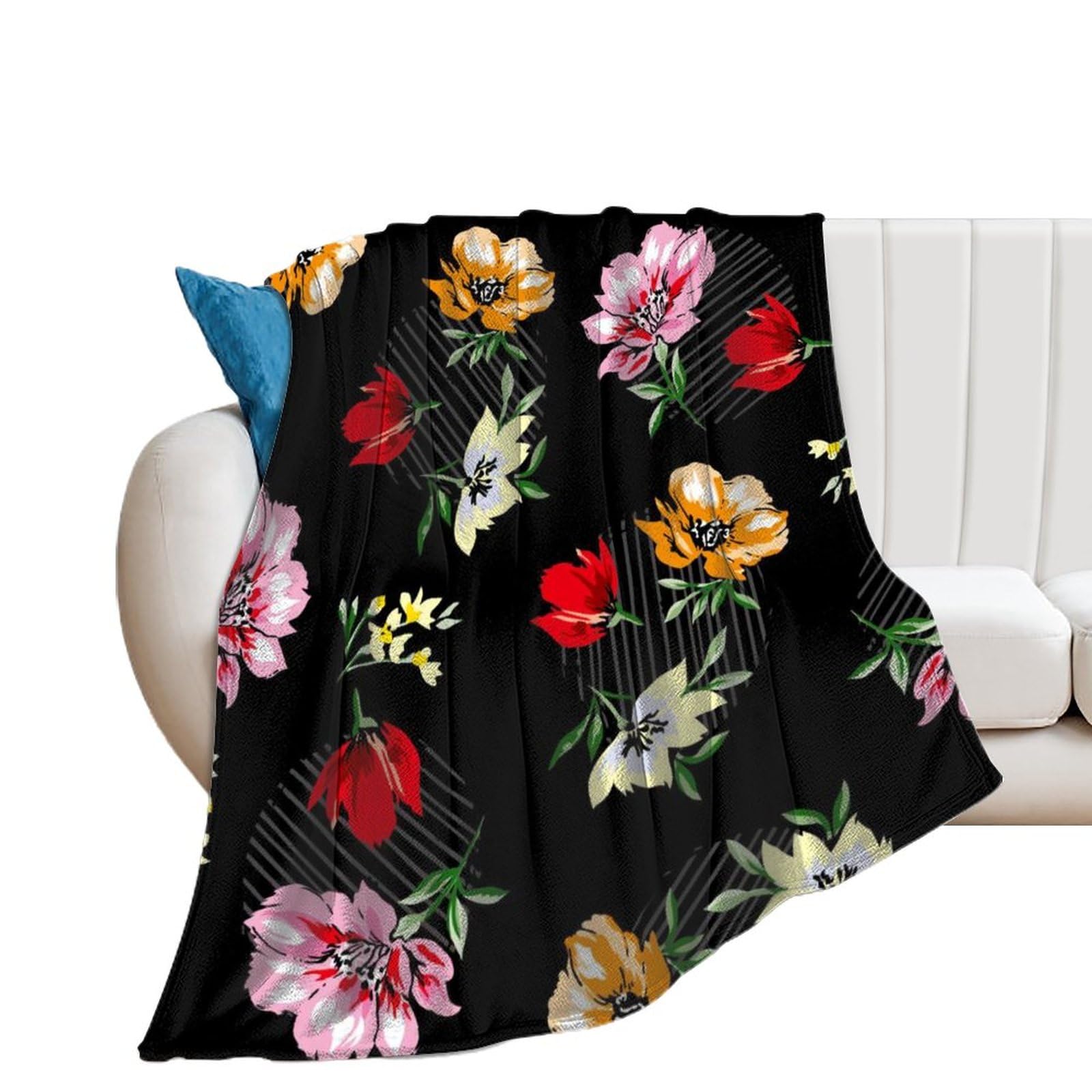 Couverture fleurs de couleur en flanelle pour réchauffer vos soirées cocooning sur le canapé