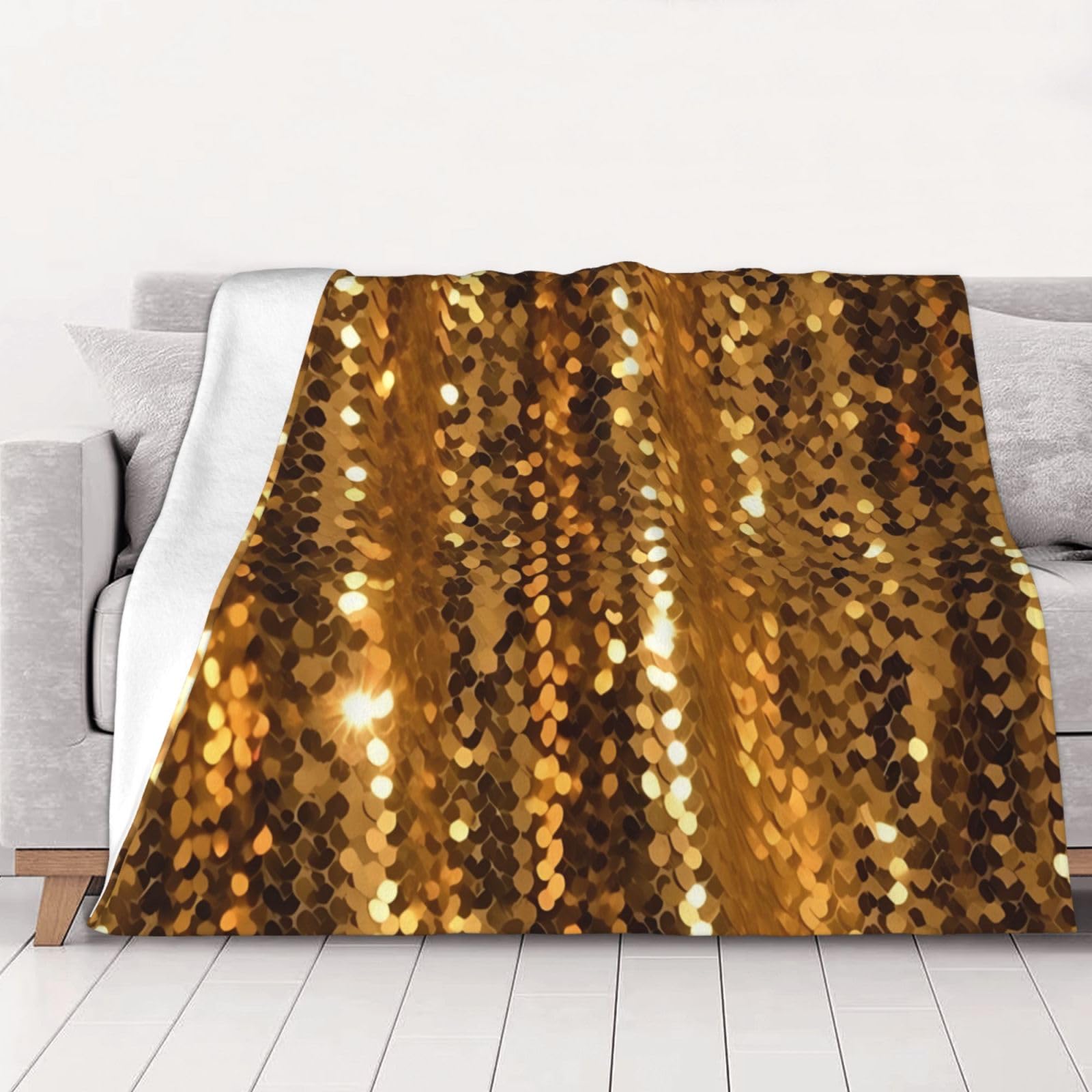 Couverture polaire pour lit et canapé : le cadeau cocooning idéal aux paillettes dorées