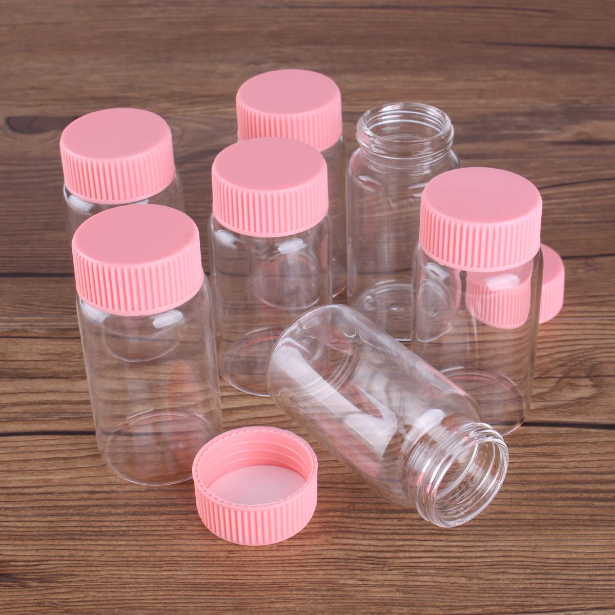 Amazon｜12個50ml-37x70mmピンクのプラスチック蓋付きガラス瓶、空の