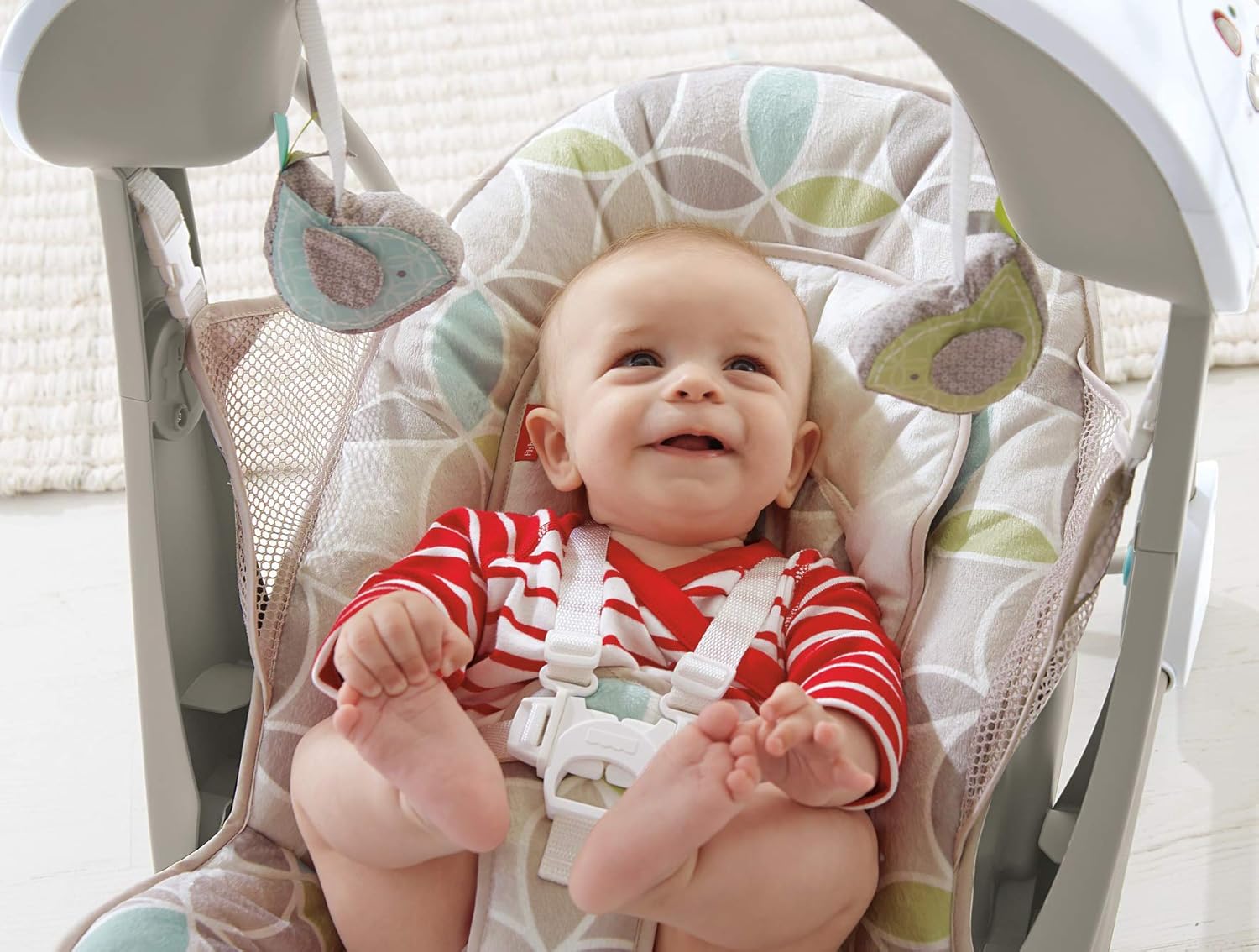 Side view of the Fisher-Price Take-Along Swing & Seat in its compact folded position.