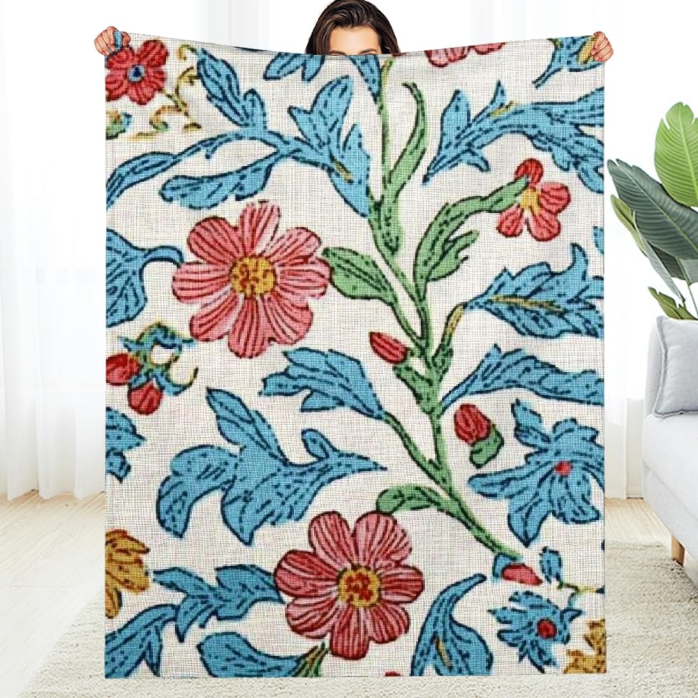 Couverture réversible en flanelle au motif floral chic et finitions haut de gamme
