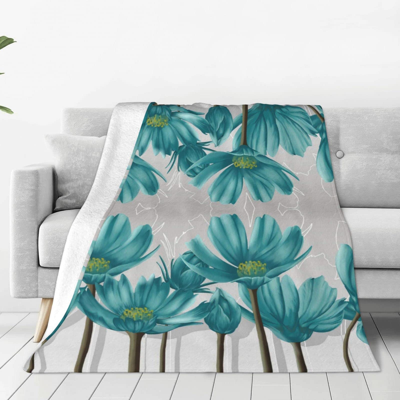 Couverture en flanelle douce motif floral bleu sarcelle pour éliminer les frissons sur le canapé