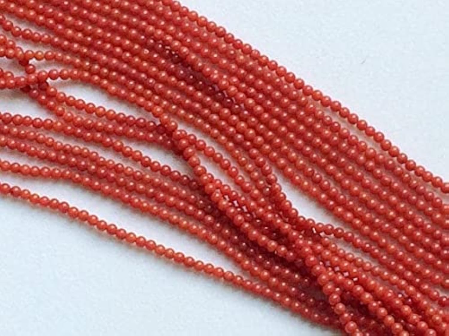 Corail naturel du Japon en perles rondes pour création de bijoux de luxe