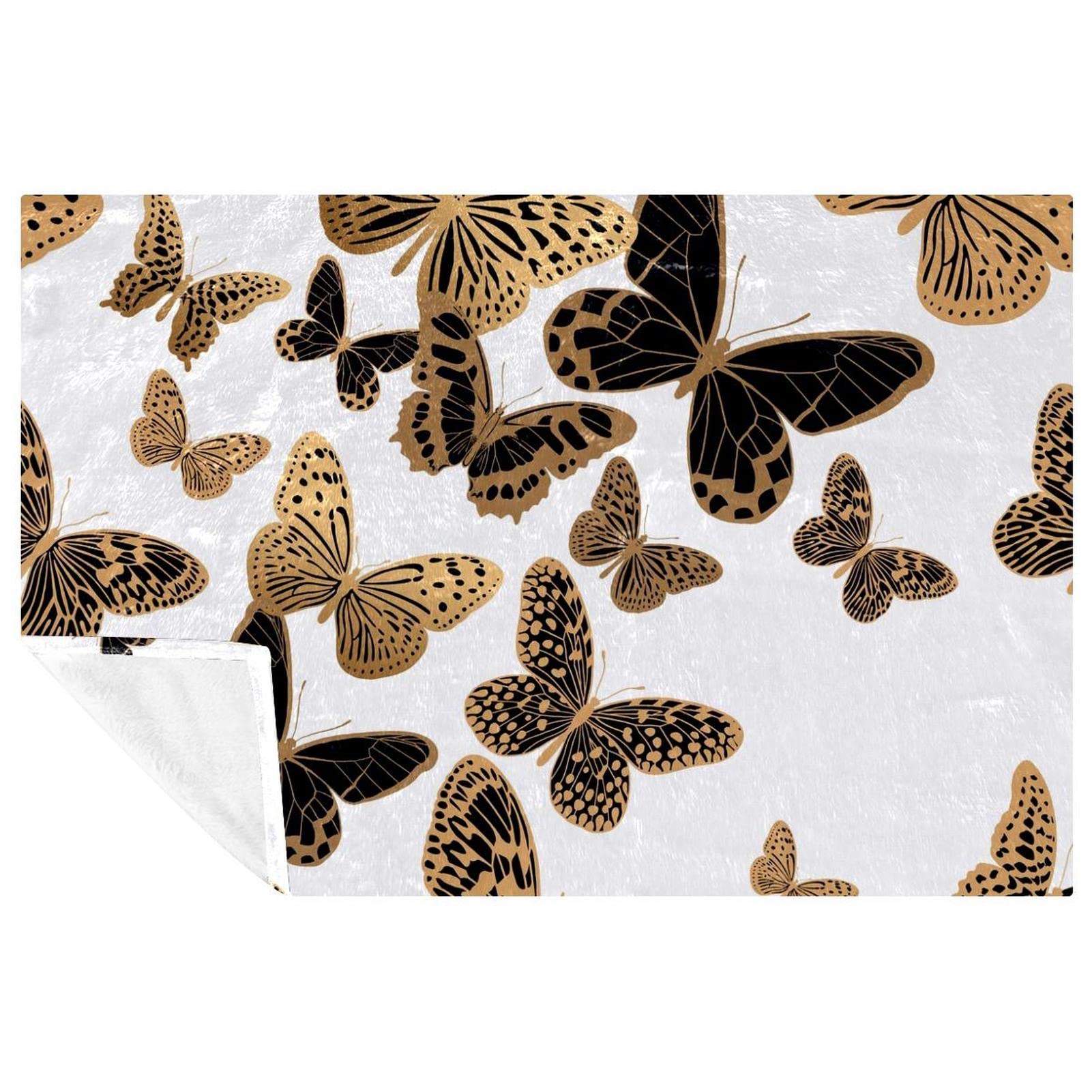 Couverture douce papillon pour des moments cocooning chaleureux au lit