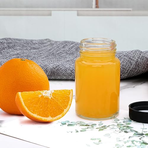 Miniatura 4 de QAPPDA Botellas de vidrio de 2 onzas, botellas pequeñas de jugo de vidrio con tapas negras para líquidos, botellas de muestra de chupito, a prueba