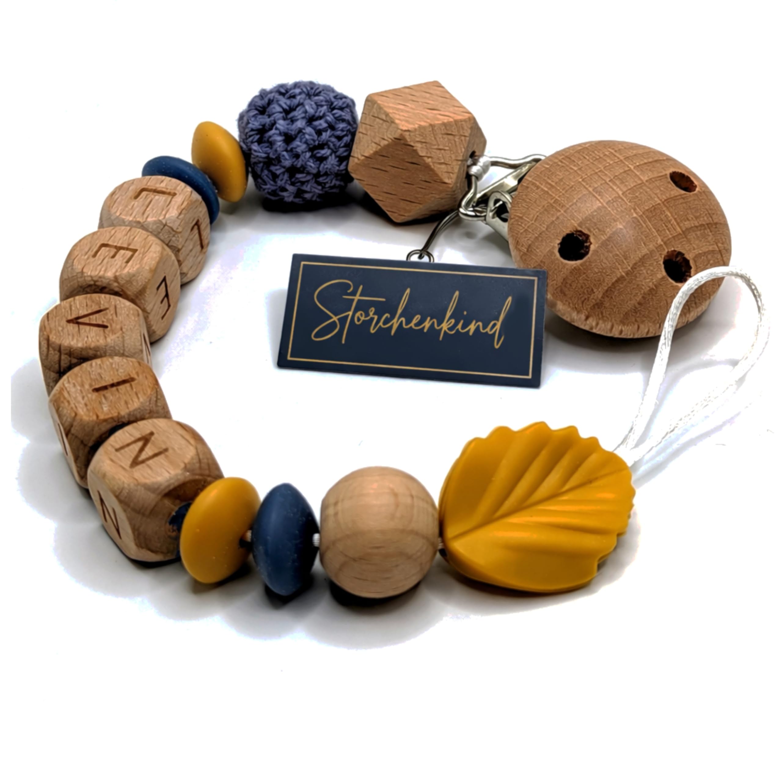 Storchenkind® – Liebevolles, handgemachtes Babyaccessoire, personalisiert mit Namen (blau/gelb)