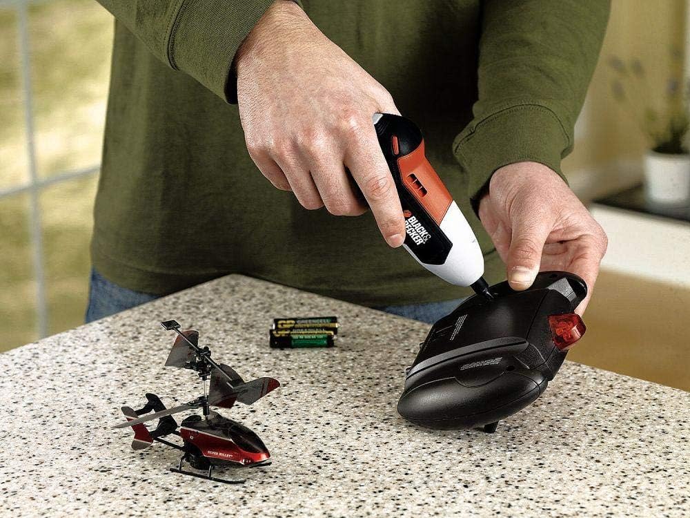 User operating screwdriver on a device