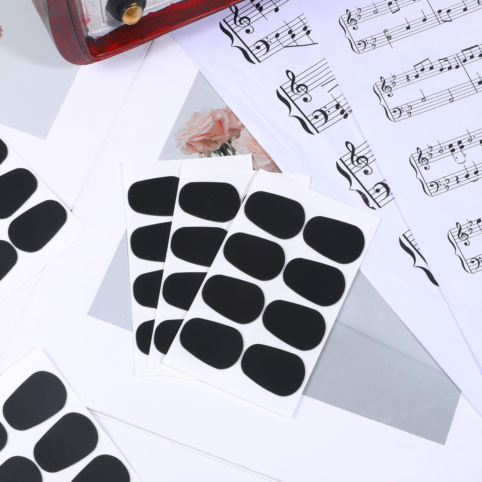 64 Stück Mundstückkissen 0,8 mm Verdickung Bissgummi Klarinette Ovale Gummi Mundstück Patches Pads für Alt Tenor Saxophon Klarinette Mundstück Kissen, Schwarz