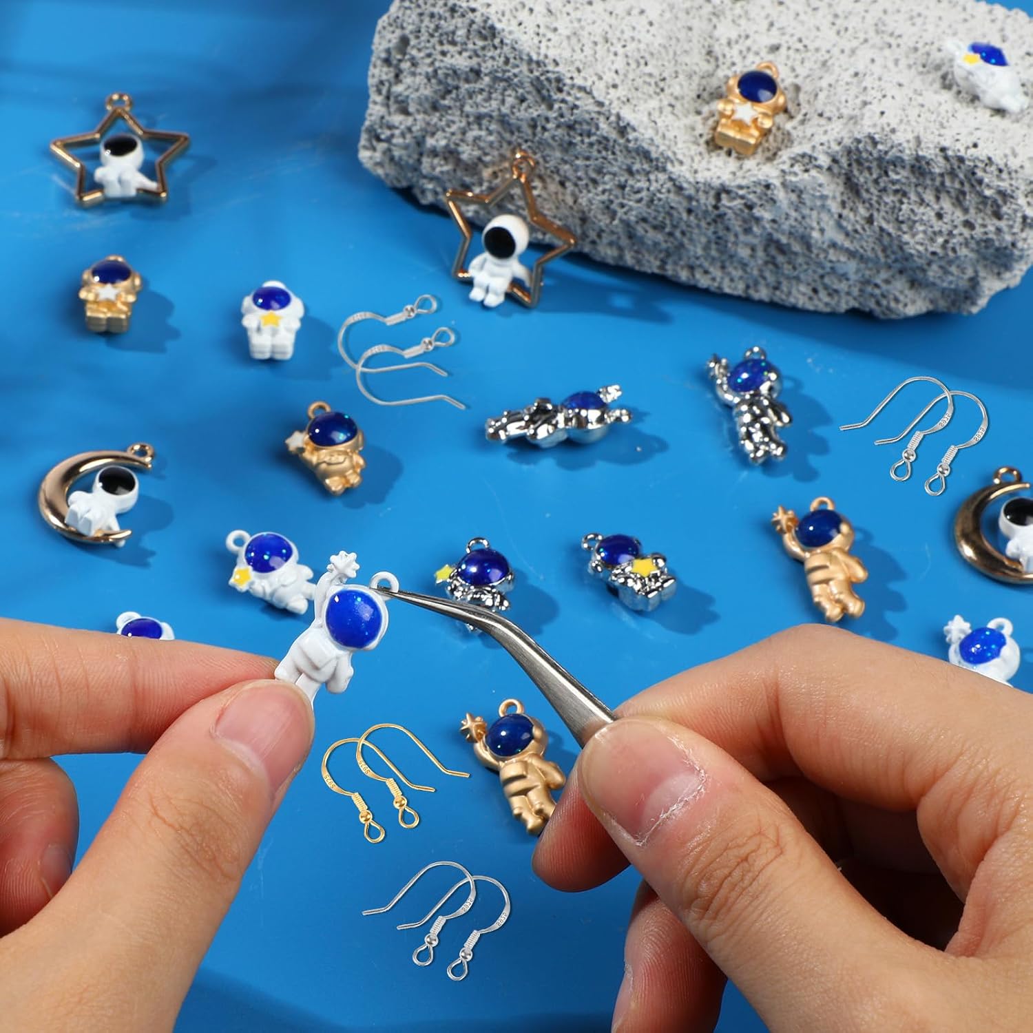 TXIN 22 Pieces Spaceman Charms 11 Styles 3D Astronaut Pendants Blue Space Stars Moon Theme Alloy Crafts Charm for DIY Jewelry Making Necklaces Bracelets Earrings