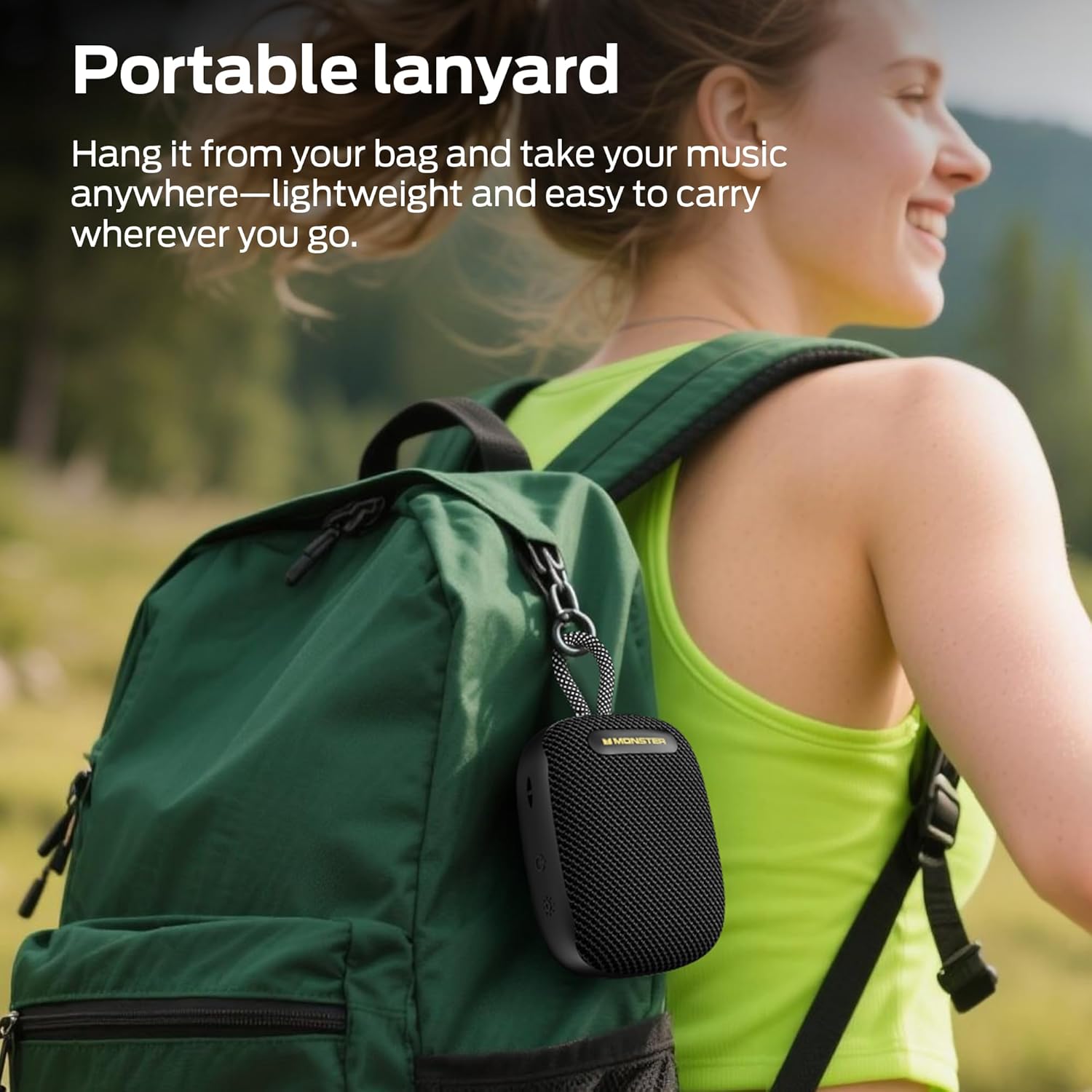 Image of the Monster S300 speaker attached to a backpack via its portable lanyard, demonstrating ease of transport.