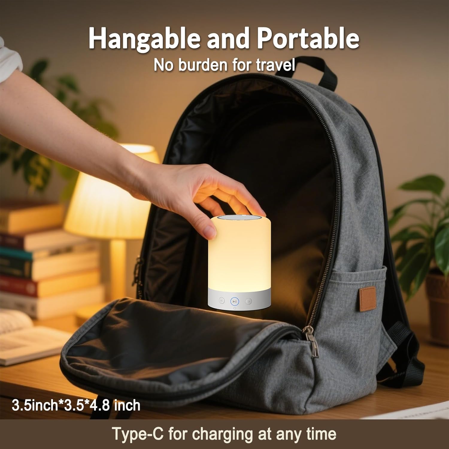 Kipcush White Noise Machine being placed into a backpack, illustrating its portability for travel.