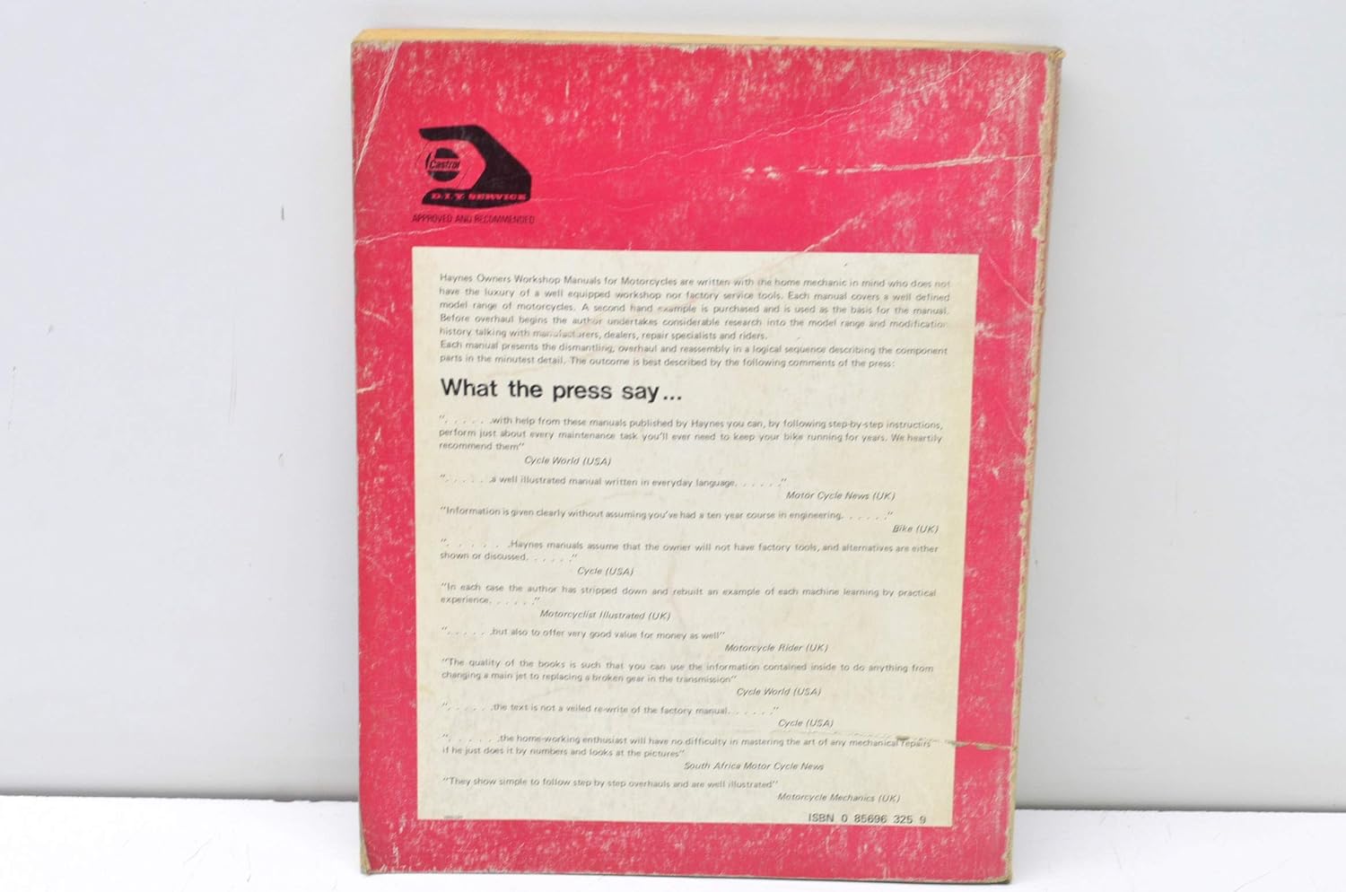 Back cover of the workshop manual with testimonials