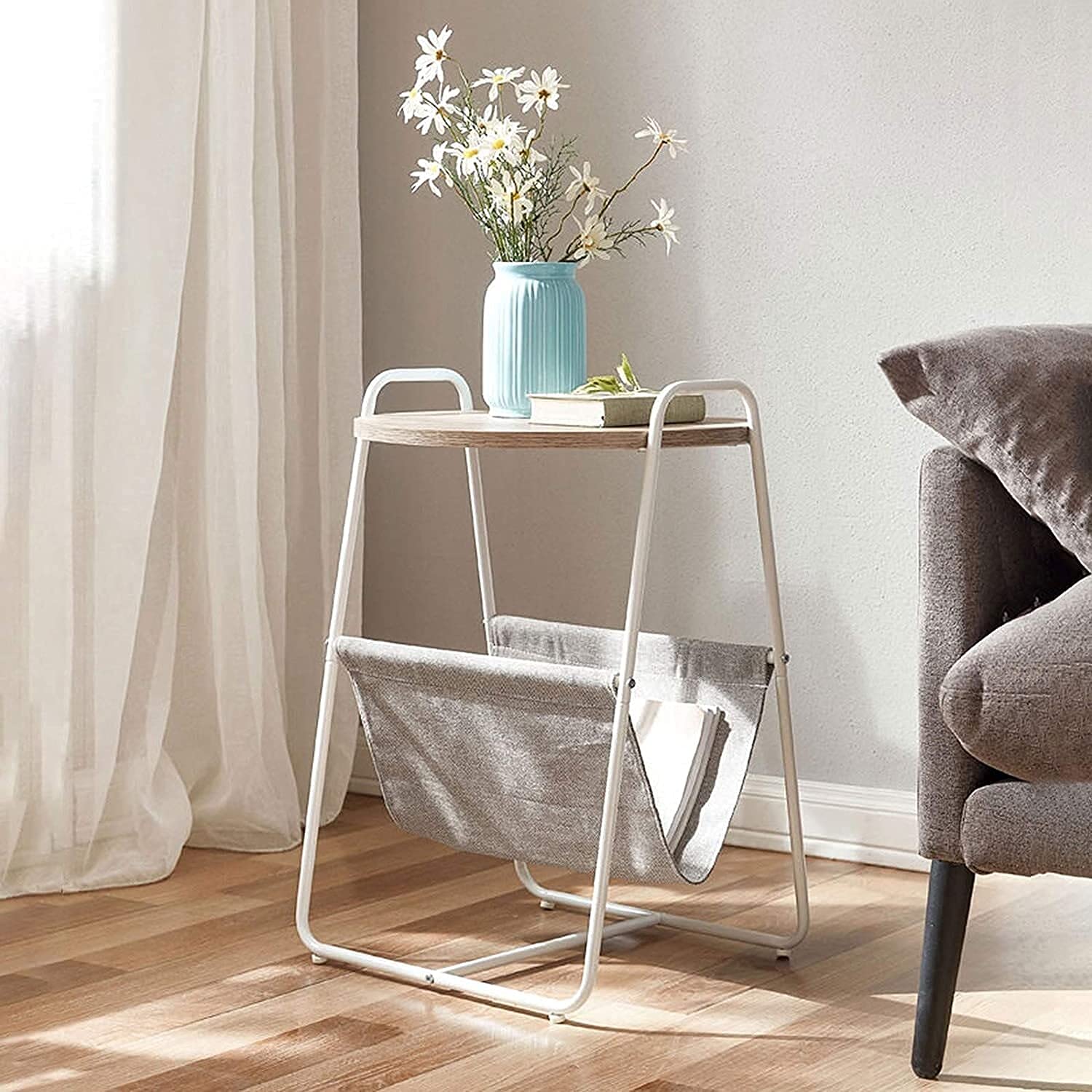 Table basse moderne en fer forgé avec grand panier de rangement en tissu pour gain de place