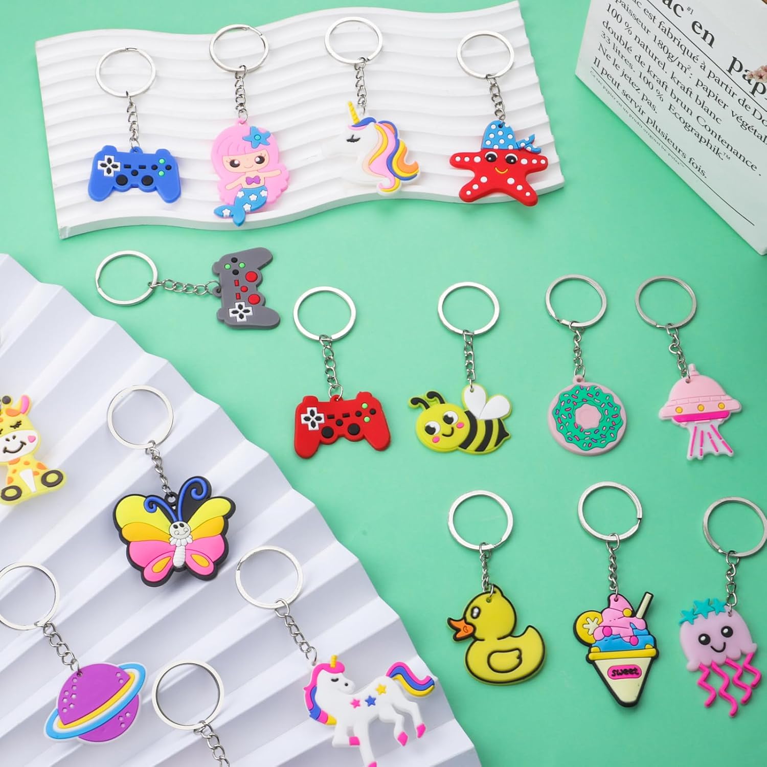 65PCs Party Favors Cartoon Keychains for Kids, Keychain Bulk for Birhtday Party, Unicorn Dinosaur Mermaid Animal Sea Dount Flower Video Ball Bulk Keychains for Party Bag Fillers Goodie Bag Stuffers