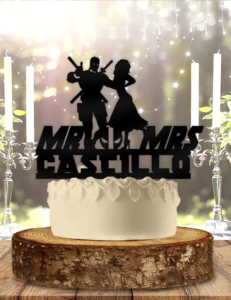 Comical Super Hero Bride and Groom Wedding Cake...