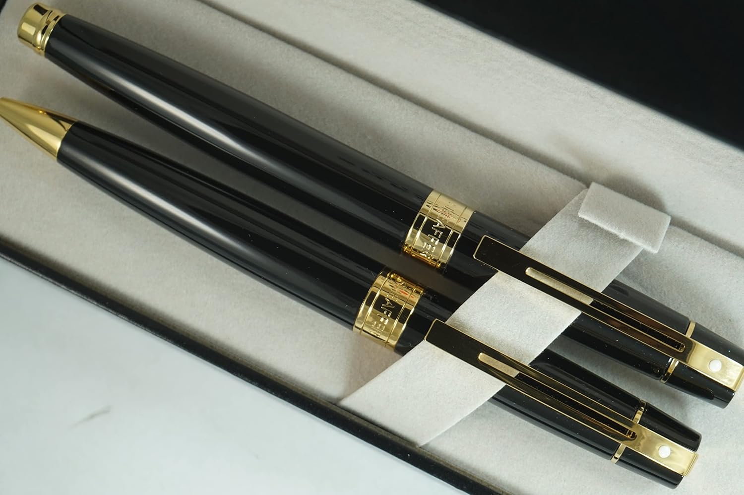 Sheaffer 300 Duo Black Lacquer and Gold Appointments Limited Series with Signature white dot of Excellence and wide band Medium Point Fountain Pen and Ballpoint Pen set.