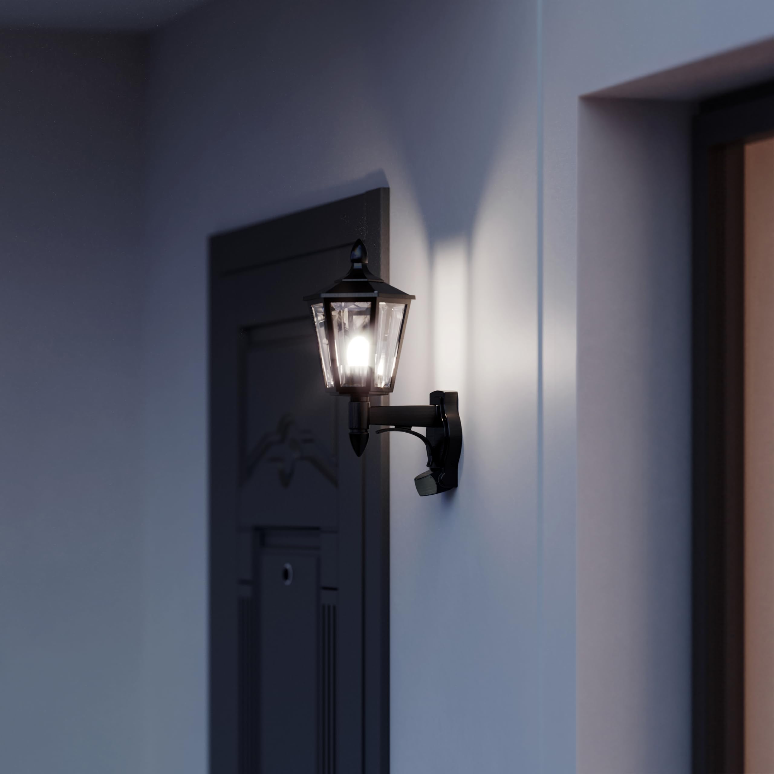 Steinel Außenleuchte L 16 S Schwarz mit Bewegungsmelder – Wandleuchte für Außen, 180° PIR-Sensor bis 10 m, Dämmerungsschalter, IP44 wetterfest, E27-Fassung, Außenbeleuchtung für Haus und Terrasse