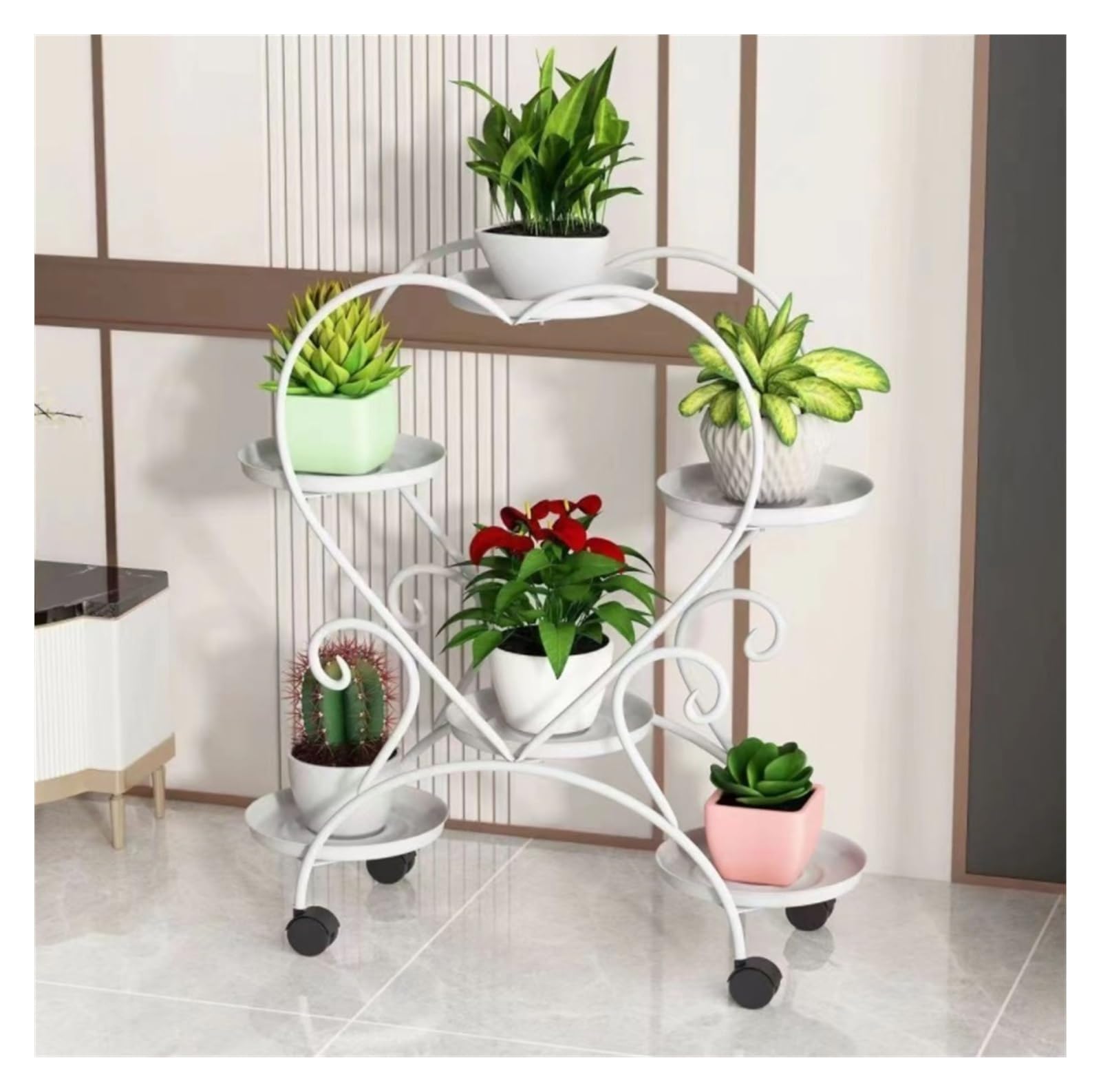 Support à plantes sur roulettes avec 4 étagères métalliques pour déplacer vos fleurs facilement