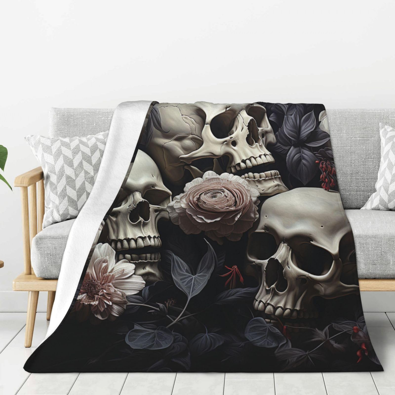 Plaid en flanelle fleurs et tête de mort pour réchauffer vos soirées cinéma sur le canapé